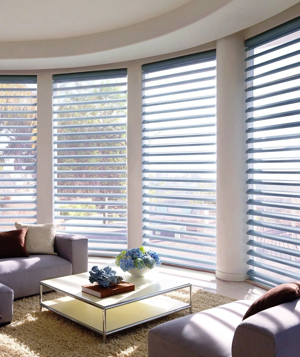 Hunter Douglas Window Treatments Pirouette in a Living Room. Available at JC Licht in Chicago, IL