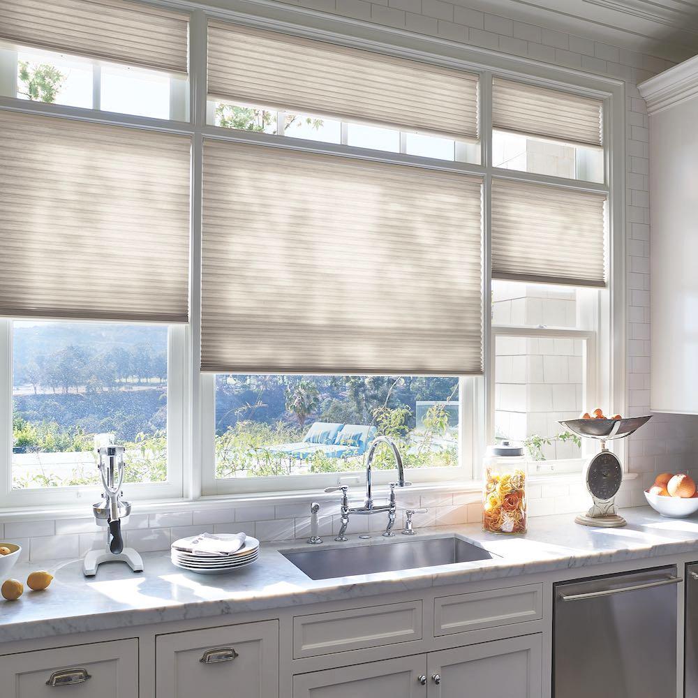 Duette window coverings with honeycomb technology in a kitchen. Available at JC Licht in Chicago, IL