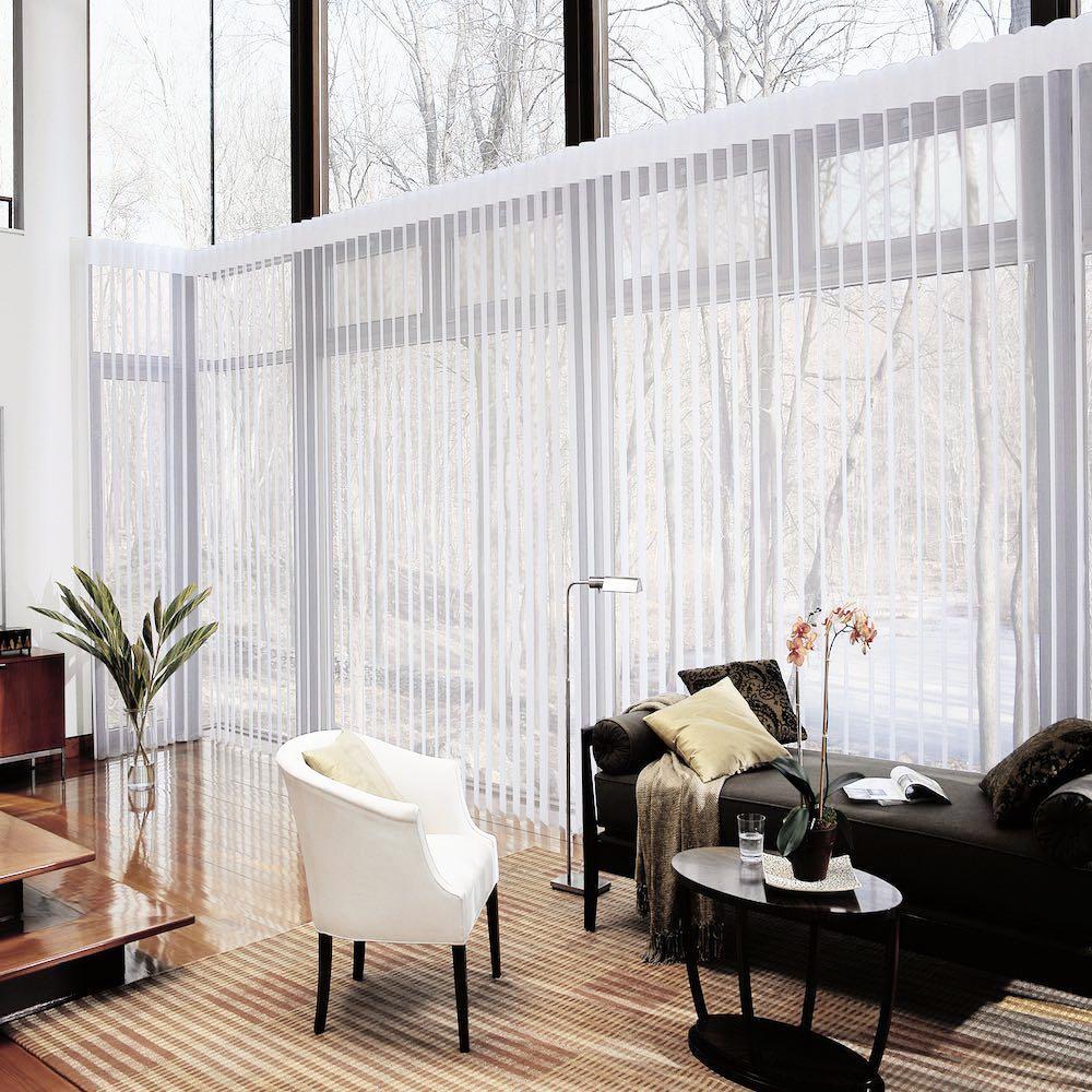 Hunter Douglas Luminette window covering in a living room available at JC Licht in Chicago