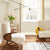 Benjamin Moore Sea Salt, a color trends 2025 color in a living room with white trim and warm tones