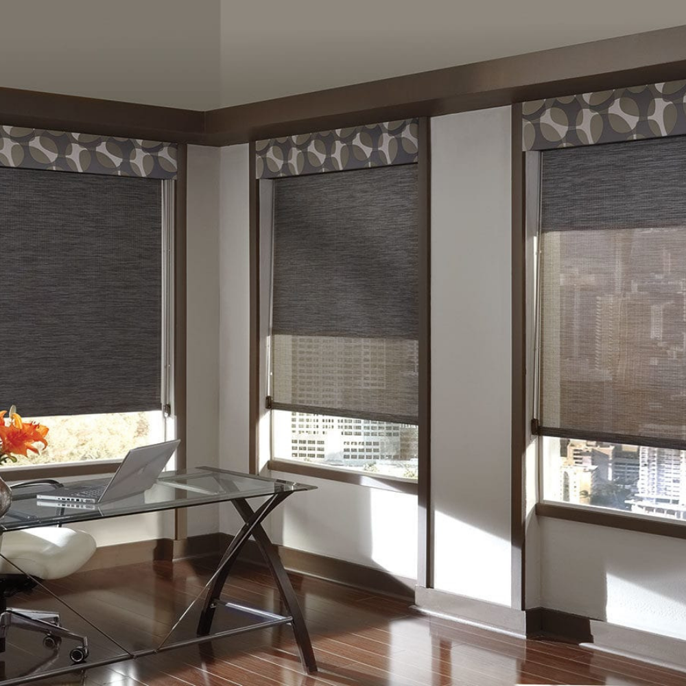 Designer Screen Roller Shades in an office. Available at JC Licht in Chicago, IL