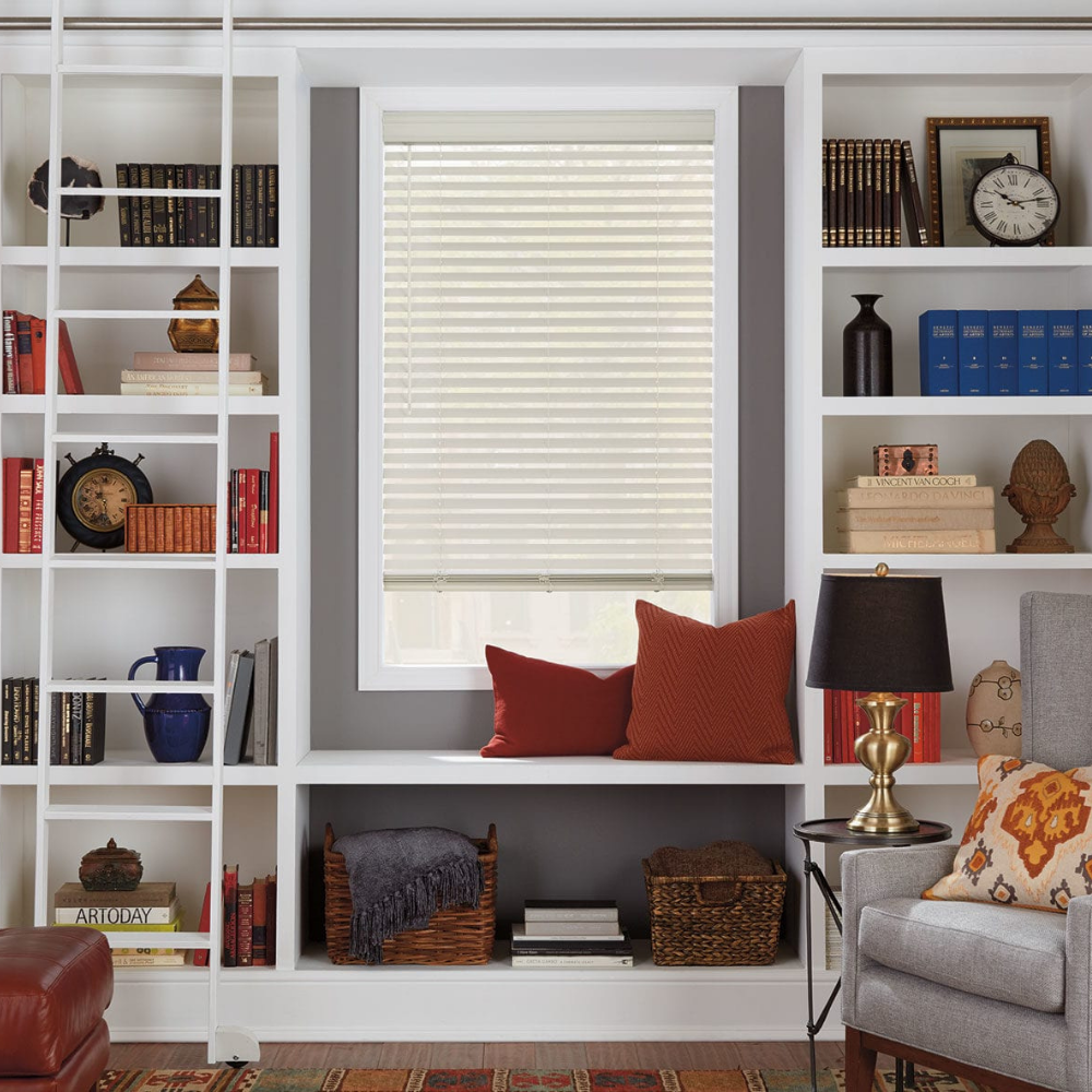 Neutral colored EverWood Distinctions window blinds used in a reading room. Available at JC Licht in Chicago, IL