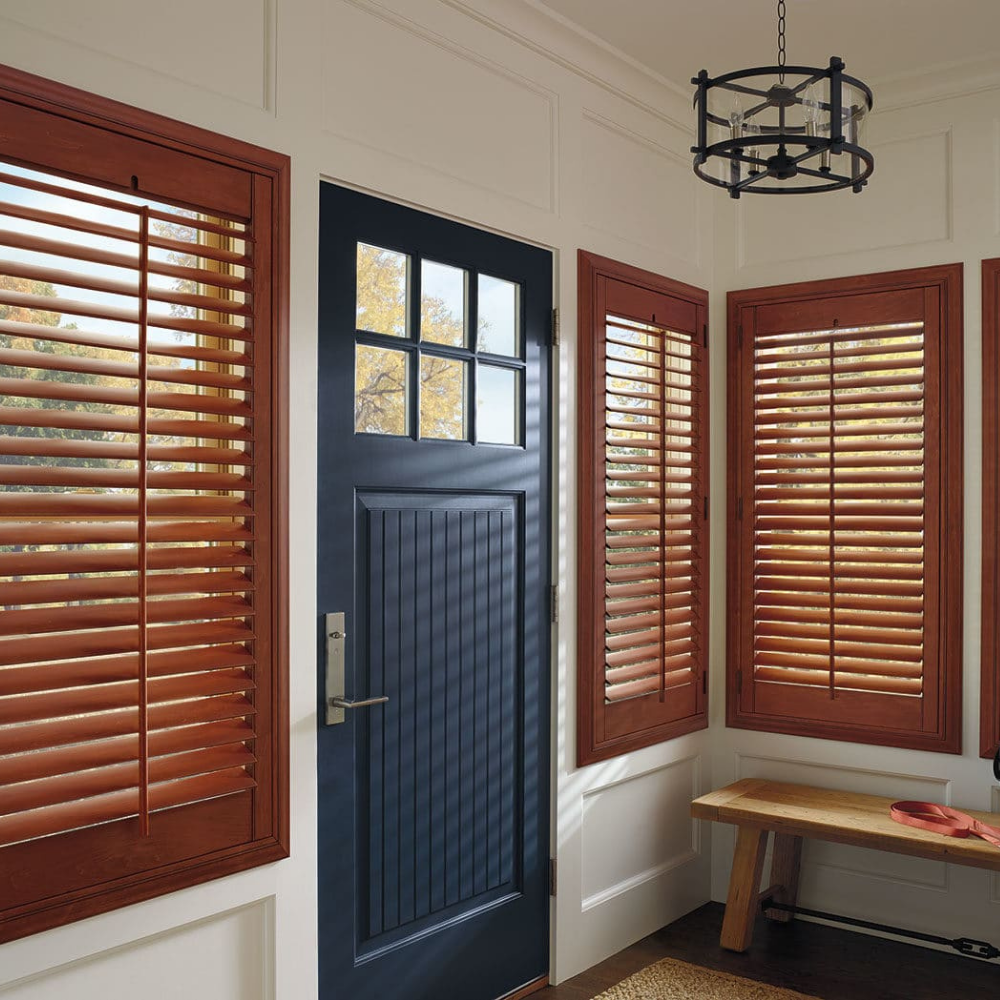 Hunter Douglas Heritance Shutters used in a front entrance. Available at JC Licht in Chicago, IL