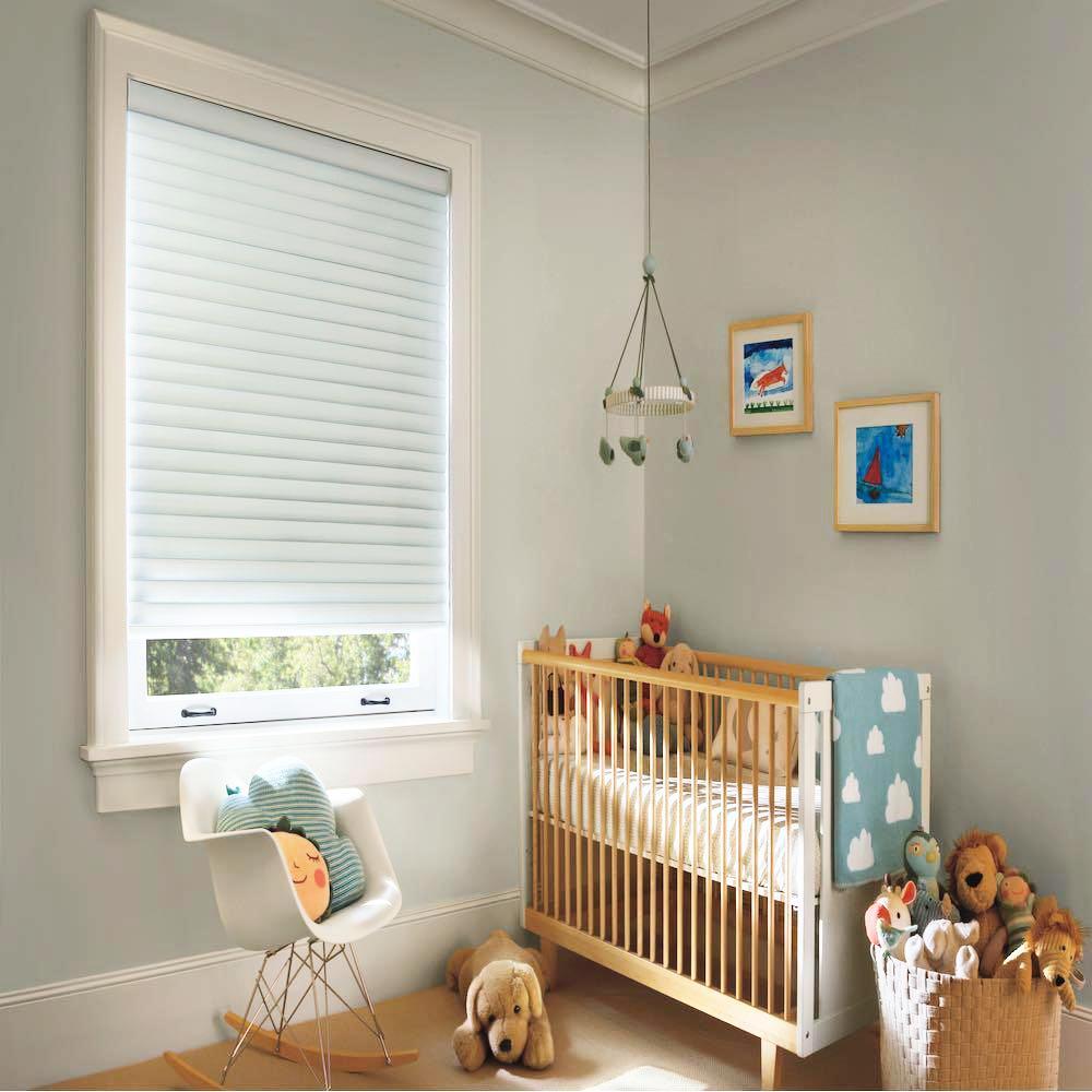 Sonnette window treatments used safely in a nursery. Available at JC Licht in Chicago, IL